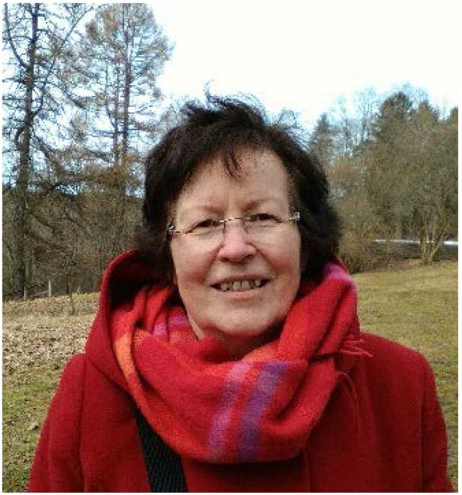 Official Statistics: Asta Manninen wearing red scarf and jacket in a meadow